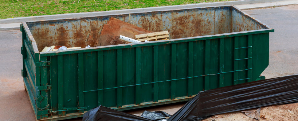 a garbage truck collecting garbage