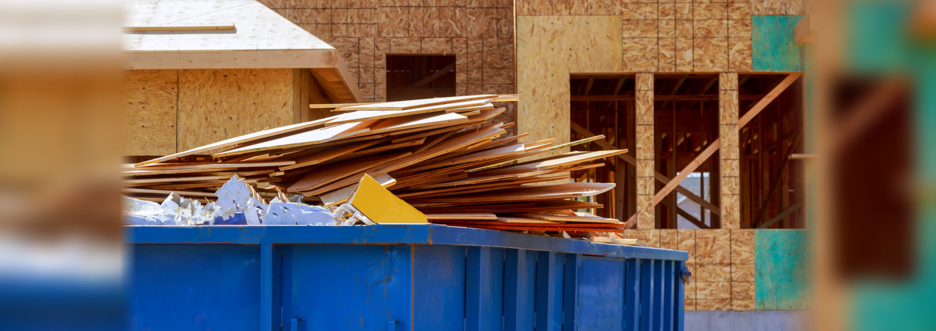 residential view of new houses being built and construction garbage