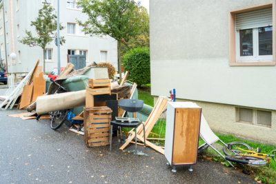 old broken furniture along the street