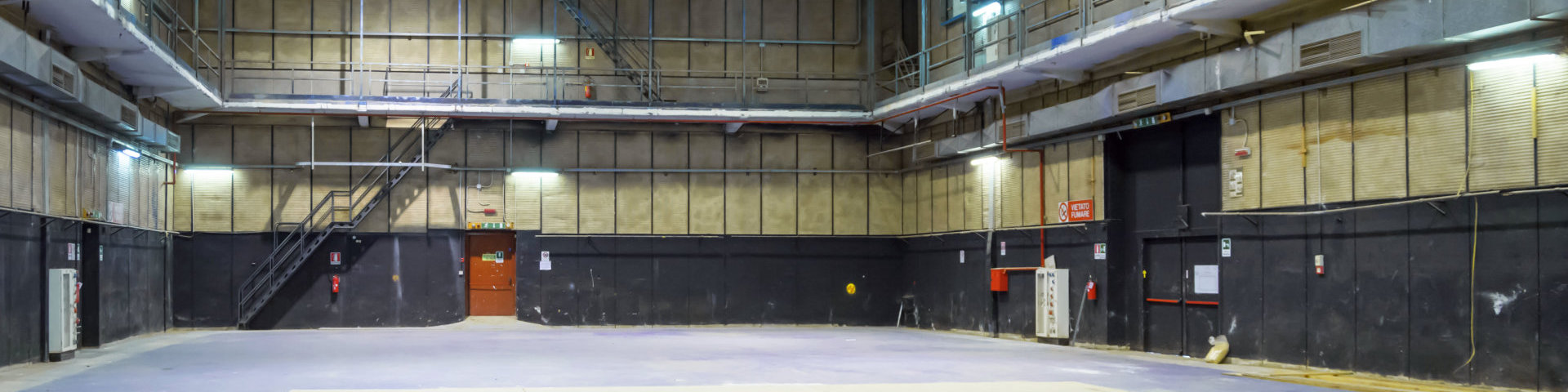 Interior of empty warehouse available as posing theater too