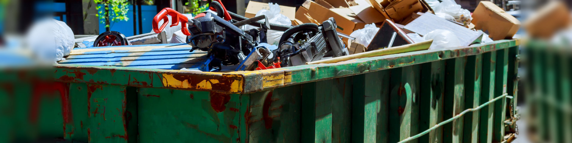 manhattan over flowing dumpsters being full with garbage. metal, landfill.